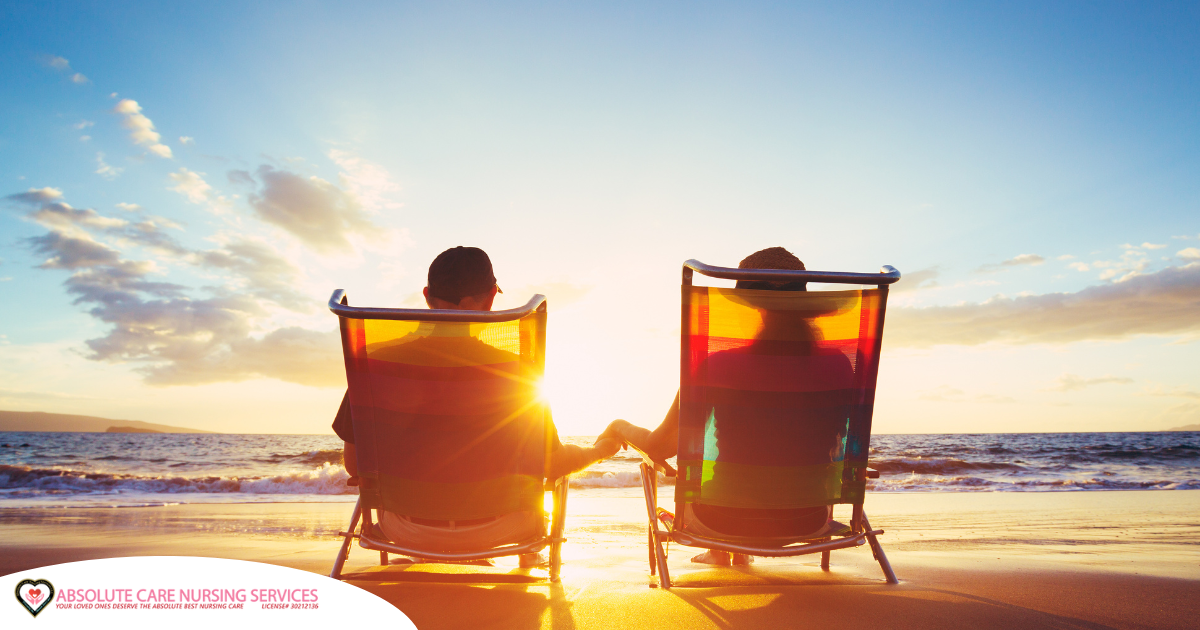 Caregiver travel hacks can help couples like this one on the beach enjoy their vacation.